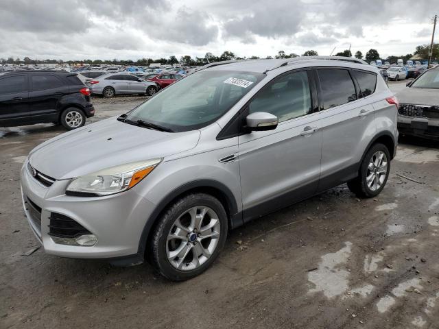FORD ESCAPE 2014 with VIN 1FMCU0JX1EUD69202 - Photo from auction