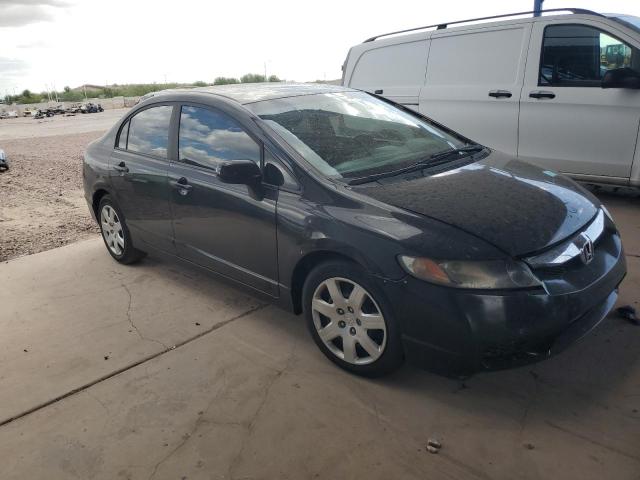 Photo 4 from auction – 2011 HONDA CIVIC LX with VIN 19XFA1F52BE038226