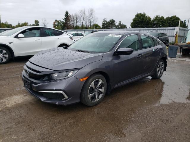 HONDA CIVIC LX 2019 with VIN 2HGFC2F57KH015031 - Photo from auction