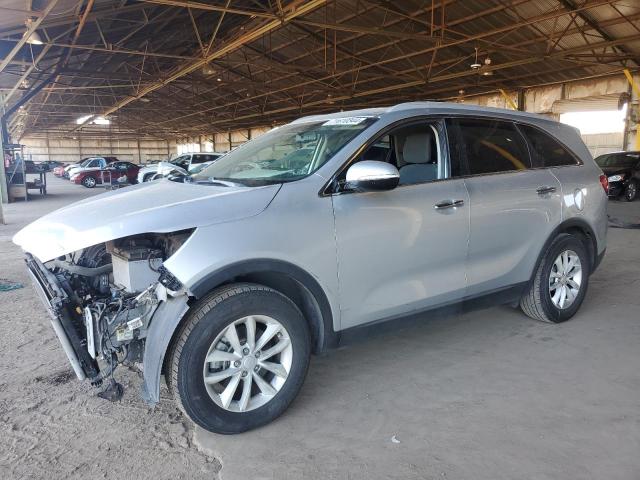 KIA SORENTO LX 2016 with VIN 5XYPG4A39GG091316 - Photo from auction