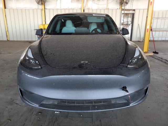 Photo 5 from auction – 2023 TESLA MODEL Y with VIN 7SAYGDED3PF971865