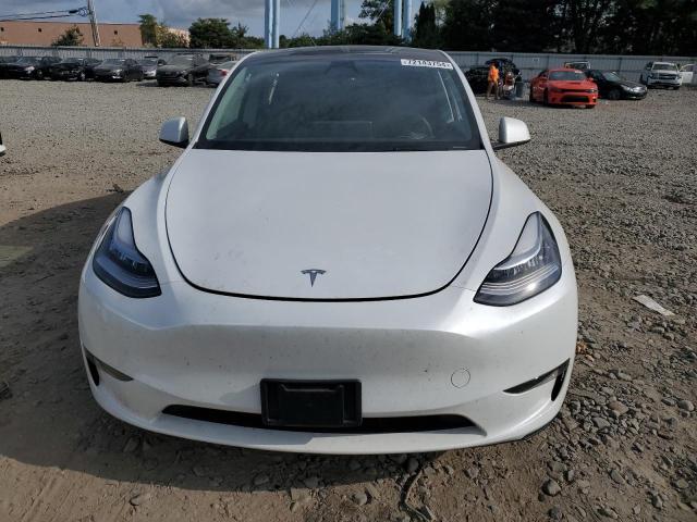 Photo 5 from auction – 2023 TESLA MODEL Y with VIN 7SAYGDEE4PA101726