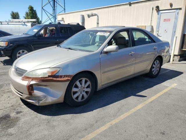 TOYOTA CAMRY LE 2002 with VIN 4T1BF30KX2U502497 - Photo from auction