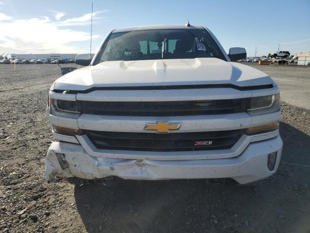 Photo 5 from auction – 2018 CHEVROLET SILVERADO with VIN 3GCUKREC3JG632099