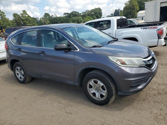 Photo 4 from auction – 2015 HONDA CR-V LX with VIN 3CZRM3H39FG704854