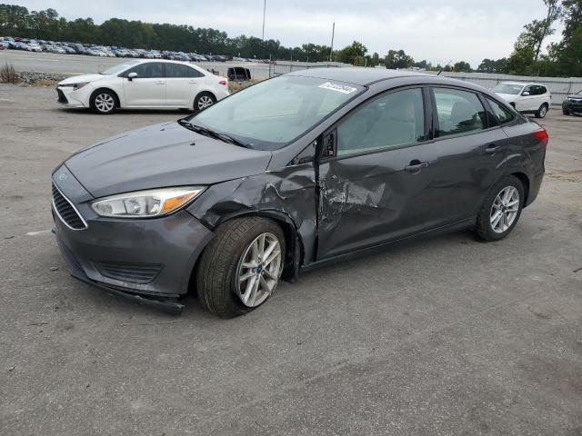 FORD FOCUS SE 2015 with VIN 1FADP3F20FL253257 - Photo from auction