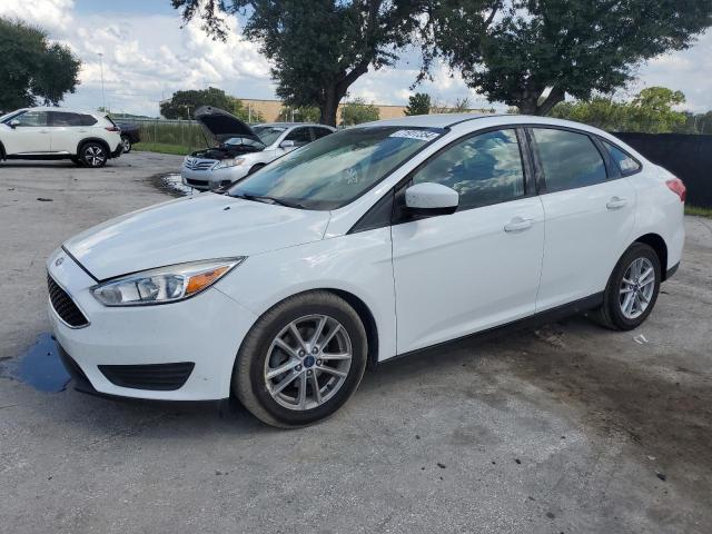 FORD FOCUS SE 2018 with VIN 1FADP3F26JL227013 - Photo from auction