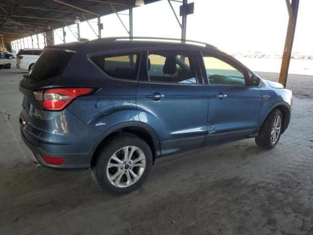 Photo 3 from auction – 2018 FORD ESCAPE SE with VIN 1FMCU9GDXJUB83833