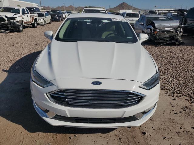 Photo 5 from auction – 2017 FORD FUSION SE with VIN 3FA6P0LU5HR288037