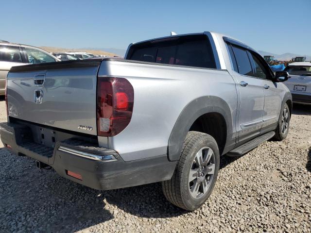 Photo 3 from auction – 2018 HONDA RIDGELINE with VIN 5FPYK3F79JB008238