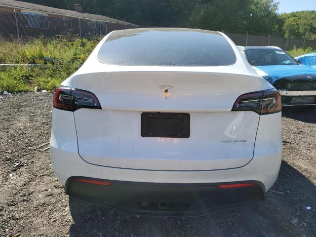 Photo 6 from auction – 2023 TESLA MODEL Y with VIN 7SAYGDEE0PF695668