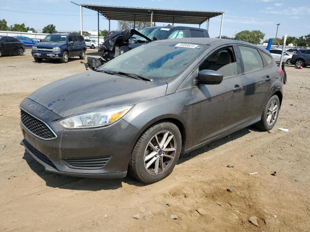 FORD FOCUS SE 2018 with VIN 1FADP3K29JL242014 - Photo from auction