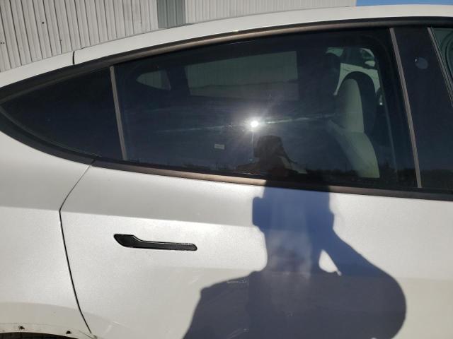 Photo 10 from auction – 2023 TESLA MODEL Y with VIN 7SAYGDEE2PF711689