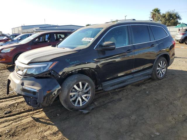 HONDA PILOT EXL 2021 with VIN 5FNYF5H51MB044272 - Photo from auction