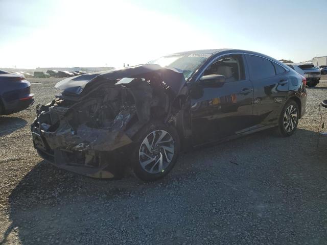 HONDA CIVIC EX 2018 with VIN 2HGFC2F76JH526827 - Photo from auction
