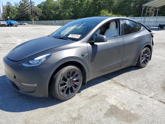 TESLA MODEL Y 2022 with VIN 7SAYGAEEXNF326814 - Photo from auction