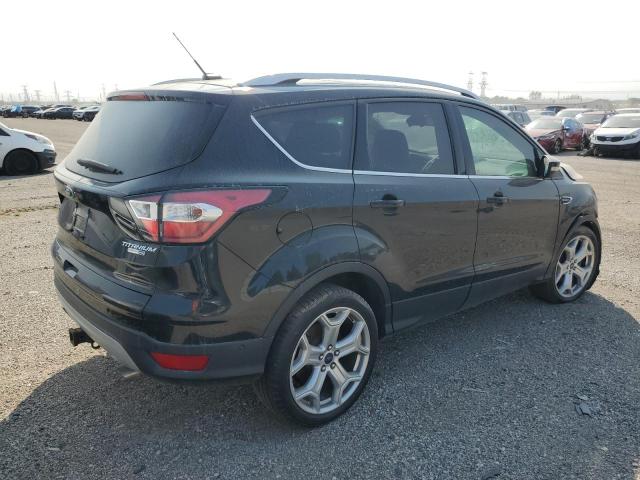 Photo 3 from auction – 2017 FORD ESCAPE TIT with VIN 1FMCU9J94HUE00971