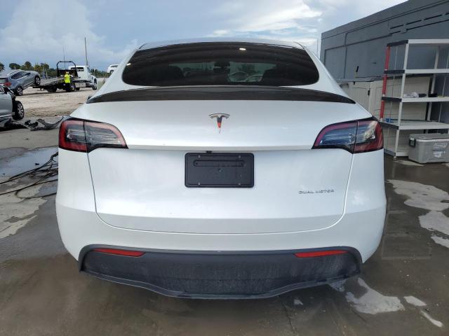 Photo 6 from auction – 2023 TESLA MODEL Y with VIN 7SAYGDEE2PA053806
