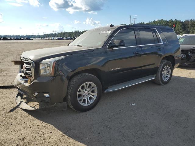 GMC YUKON SLE 2015 with VIN 1GKS1AKC3FR170364 - Photo from auction