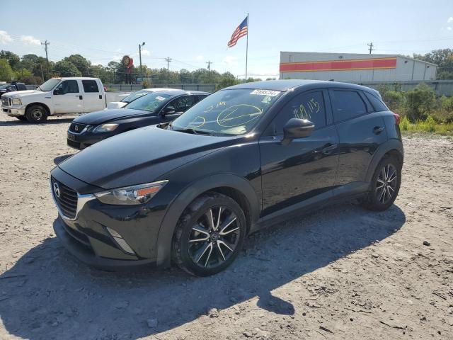 MAZDA CX-3 TOURI 2018 with VIN JM1DKDC71J0309831 - Photo from auction