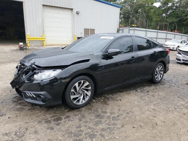HONDA CIVIC EX 2017 with VIN 19XFC2F7XHE027890 - Photo from auction