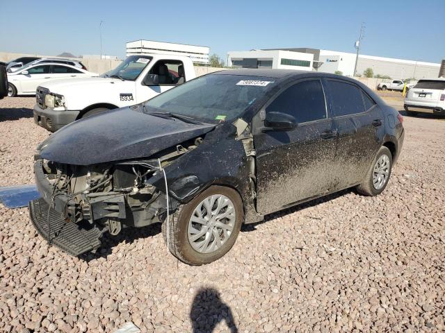 TOYOTA COROLLA L 2017 with VIN 5YFBURHE9HP647077 - Photo from auction