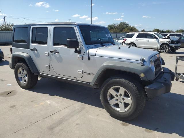 Photo 4 from auction – 2011 JEEP WRANGLER U with VIN 1J4BA6H14BL552456