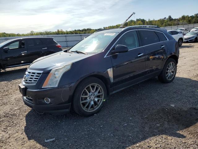 CADILLAC SRX PREMIU 2014 with VIN 3GYFNDE38ES661775 - Photo from auction