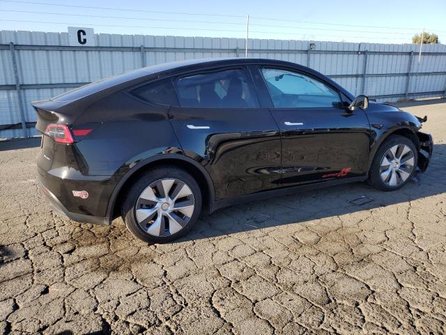 Photo 3 from auction – 2023 TESLA MODEL Y with VIN 7SAYGAEE7PF891413