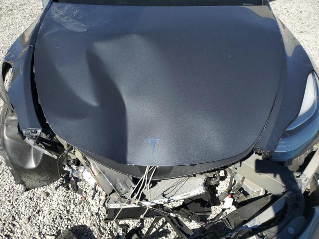 Photo 11 from auction – 2023 TESLA MODEL Y with VIN 7SAYGDEE4PA101211