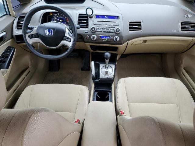 Photo 8 from auction – 2006 HONDA CIVIC HYBR with VIN JHMFA36276S011204