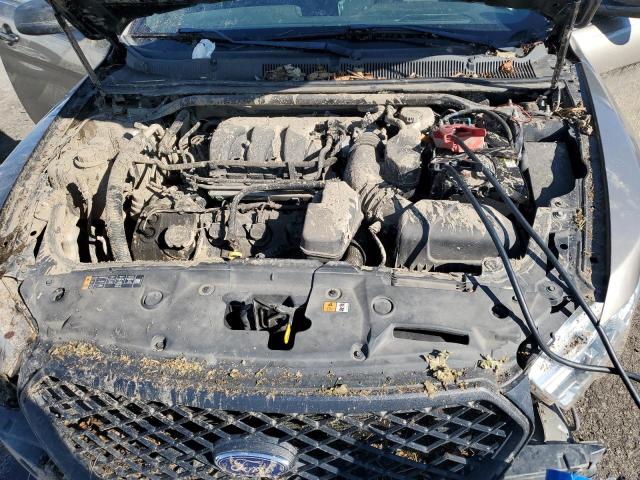Photo 11 from auction – 2014 FORD TAURUS POL with VIN 1FAHP2MK0EG182521