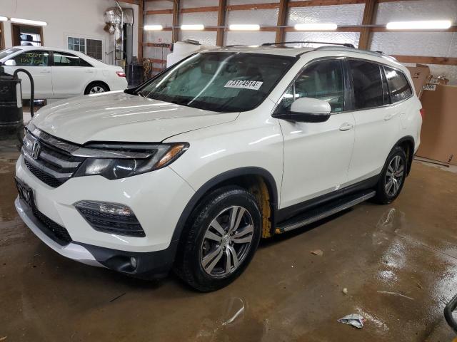 HONDA PILOT EXL 2018 with VIN 5FNYF6H53JB021884 - Photo from auction