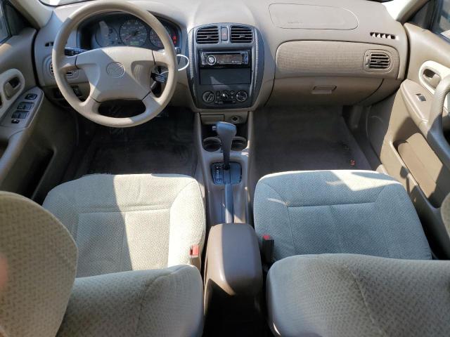 Photo 8 from auction – 1999 MAZDA PROTEGE DX with VIN JM1BJ2220X0157036