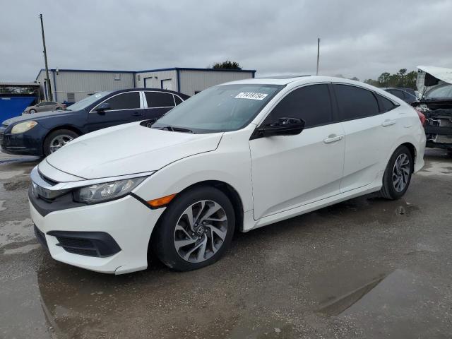 HONDA CIVIC EX 2017 with VIN 2HGFC2F77HH573343 - Photo from auction