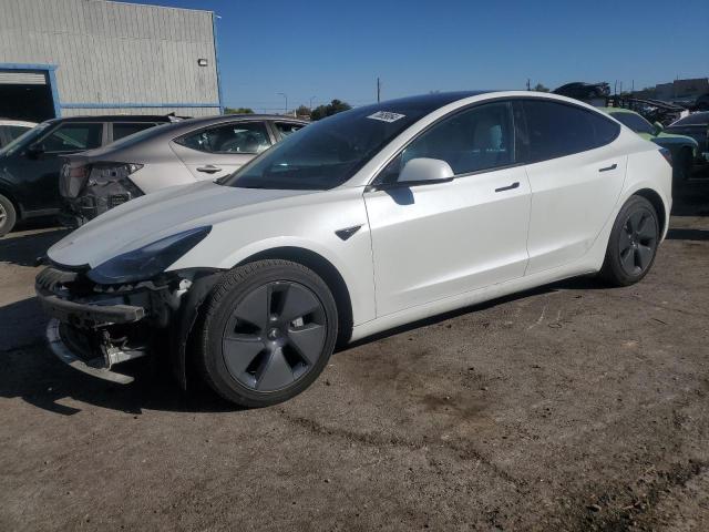 TESLA MODEL 3 2022 with VIN 5YJ3E1EA2NF147743 - Photo from auction