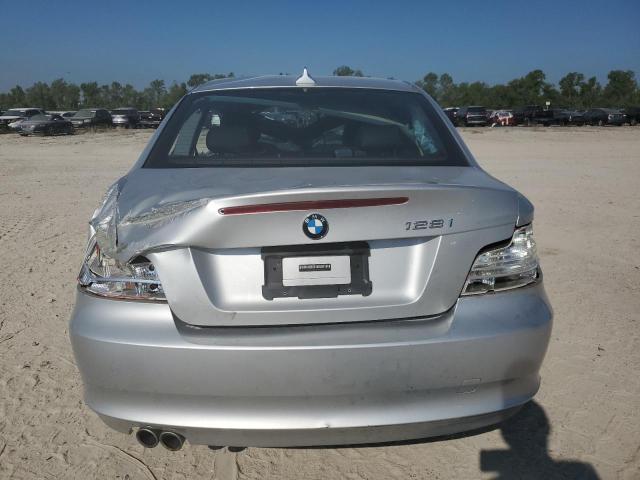 Photo 6 from auction – 2009 BMW 128 I with VIN WBAUP73529VF07012