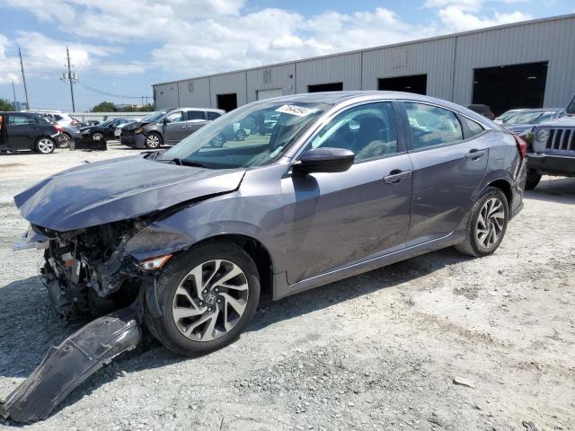 HONDA CIVIC EX 2017 with VIN 19XFC2F7XHE055236 - Photo from auction