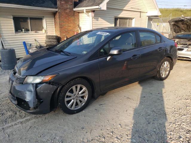 HONDA CIVIC EXL 2012 with VIN 2HGFB2F97CH592052 - Photo from auction