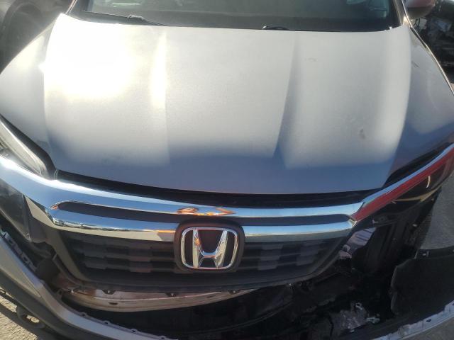 Photo 11 from auction – 2018 HONDA RIDGELINE with VIN 5FPYK3F67JB011758