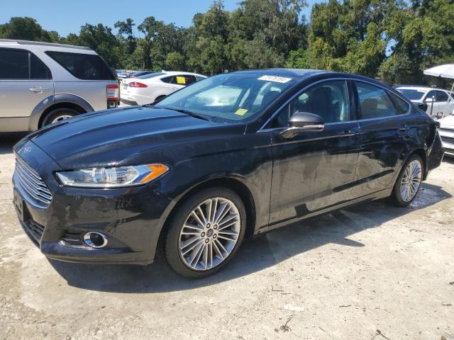 FORD FUSION SE 2014 with VIN 3FA6P0H90ER305052 - Photo from auction