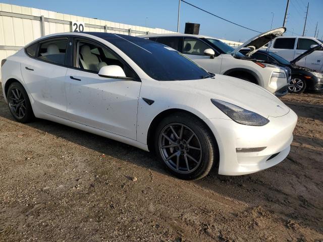 Photo 4 from auction – 2022 TESLA MODEL 3 with VIN 5YJ3E1EB8NF101584