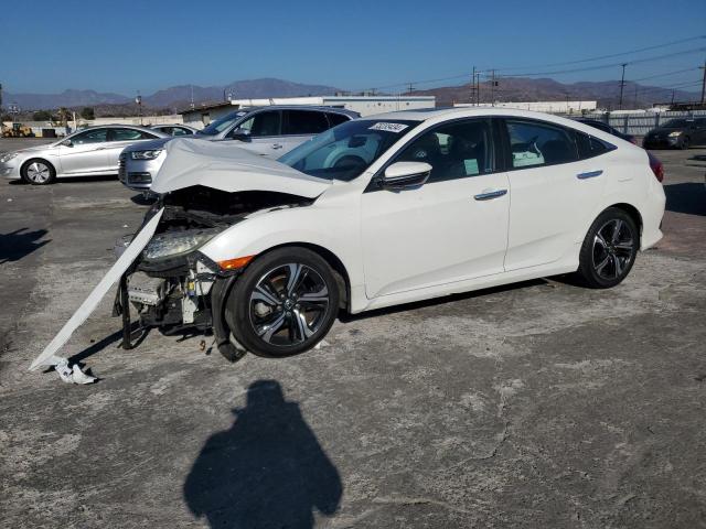 Photo 1 from auction – 2016 HONDA CIVIC TOUR with VIN 2HGFC1F91GH647804