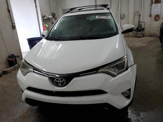 Photo 5 from auction – 2017 TOYOTA RAV4 XLE with VIN 2T3WFREV8HW385963