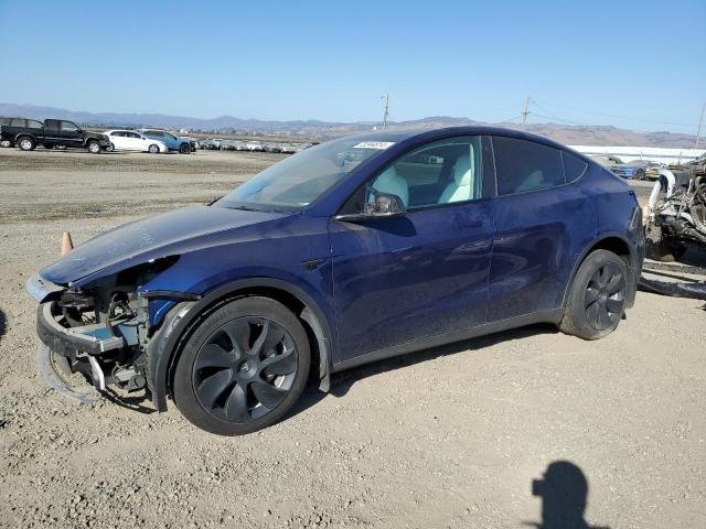 TESLA MODEL Y 2023 with VIN 7SAYGDEE7PF628033 - Photo from auction