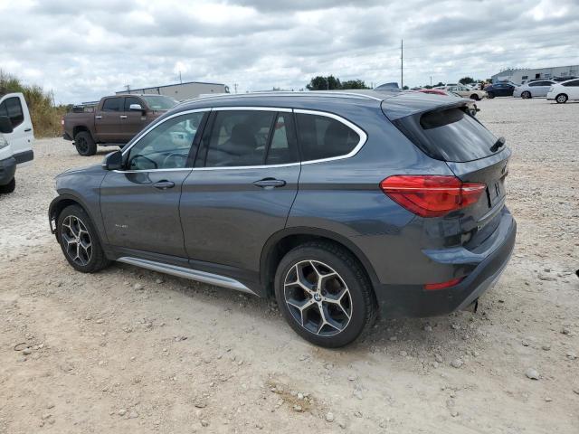 Photo 2 from auction – 2017 BMW X1 XDRIVE2 with VIN WBXHT3C39H5F69094