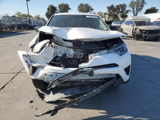 Photo 5 from auction – 2017 TOYOTA RAV4 LE with VIN 2T3BFREV2HW660158