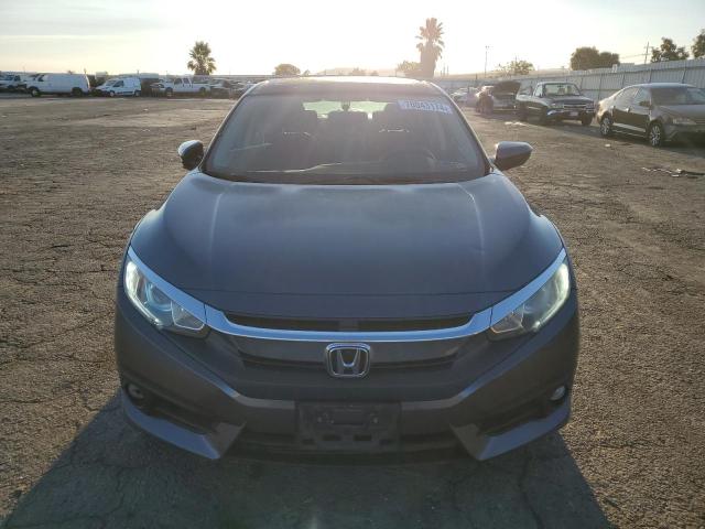 Photo 5 from auction – 2016 HONDA CIVIC EX with VIN 2HGFC1F36GH643307