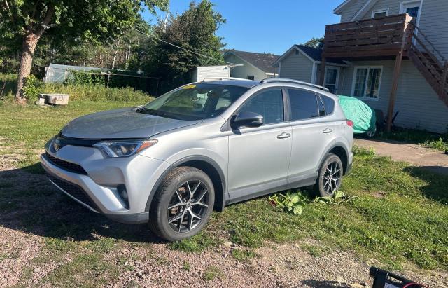 Photo 2 from auction – 2018 TOYOTA RAV4 LE with VIN 2T3BFREVXJW707944