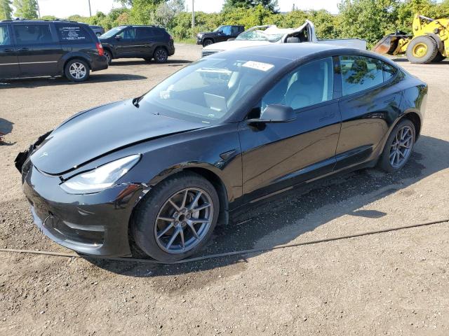 TESLA MODEL 3 2021 with VIN 5YJ3E1EA7MF857414 - Photo from auction